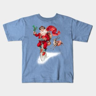 Santa Claus riding a penny farthing Kids T-Shirt